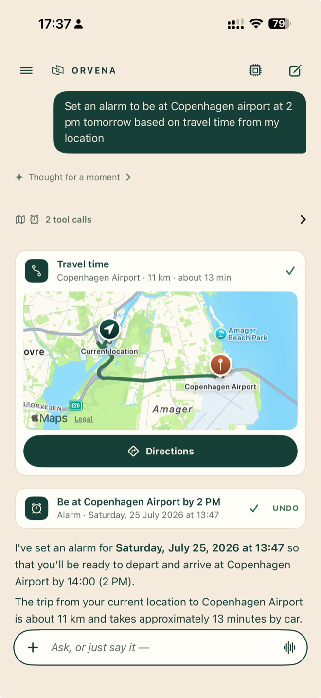 Orvena chat screen: the user asks for an alarm to be at Copenhagen Airport at 2pm tomorrow based on travel time; a travel time card shows the route on a map, an alarm receipt reads Be at Copenhagen Airport by 2 PM at 13:47 with an undo button, and the assistant explains the departure math.